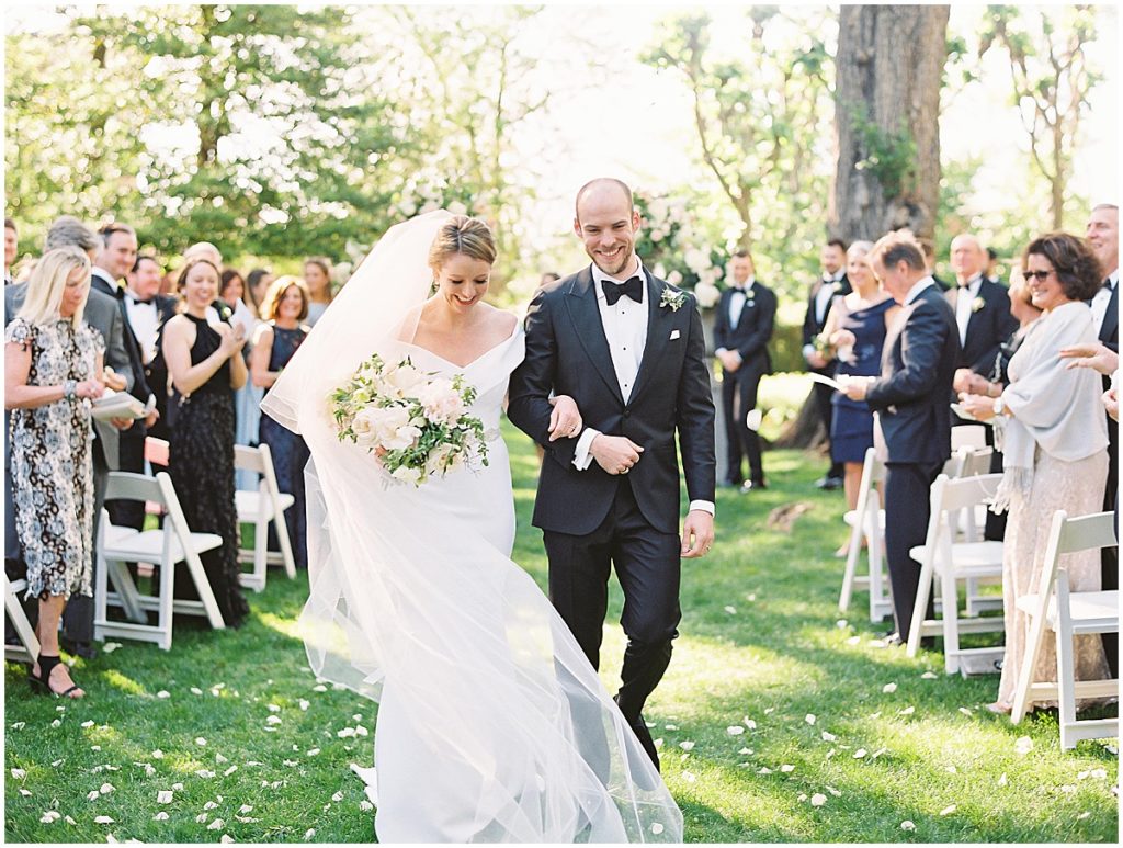 Bride and Groom Walking Up the Aisle Cheers Darling Events Wedding in Washington DC © Bonnie Sen Photography