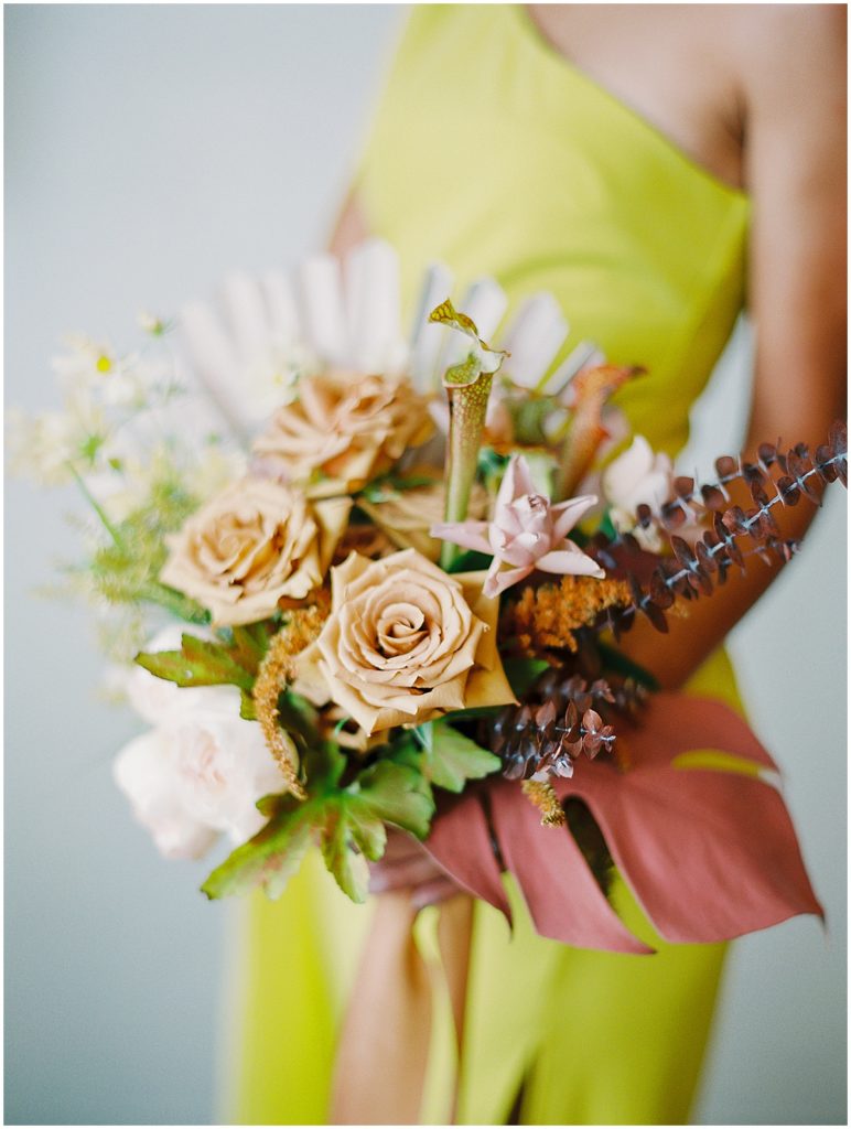 Bright Yellow Rehearsal Dinner Dress and Earth Tone Bridal Bouquet © Bonnie Sen Photography