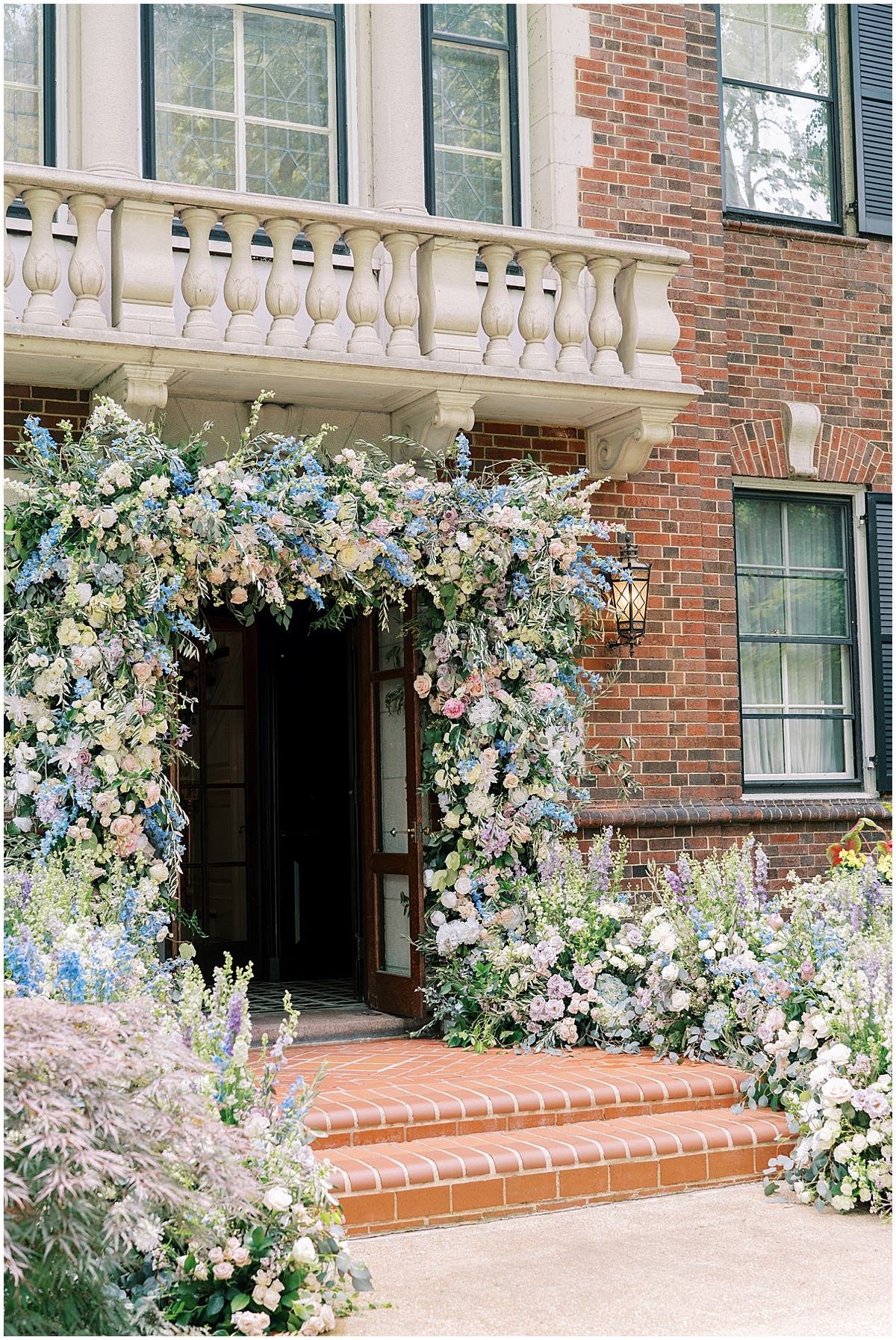 Grand Floral Entry Arch Over Doorway © Bonnie Sen Photography 